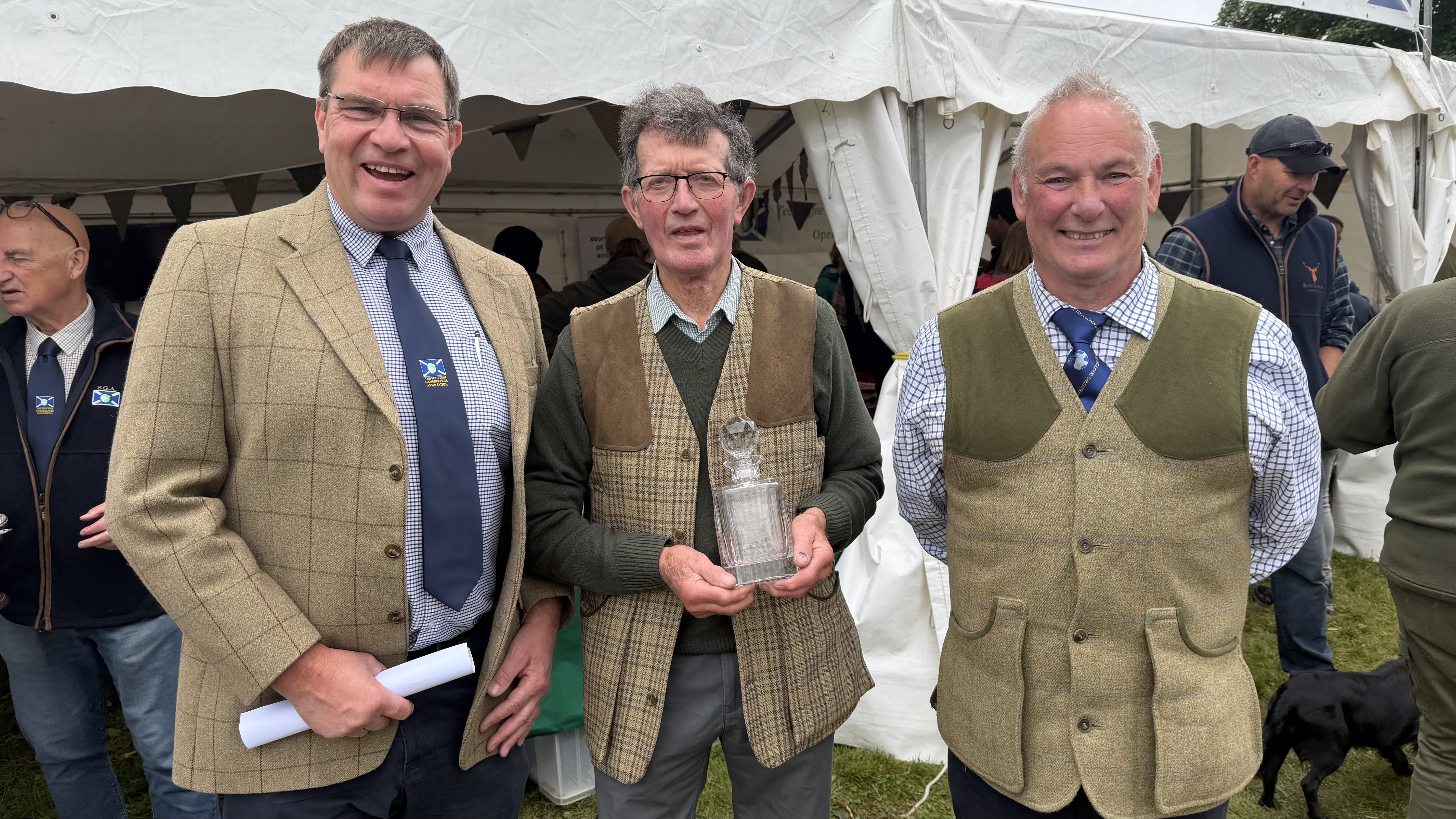 Scottish Gamekeeper Davie Taylor of Logie receiving his award for services to conservation and community