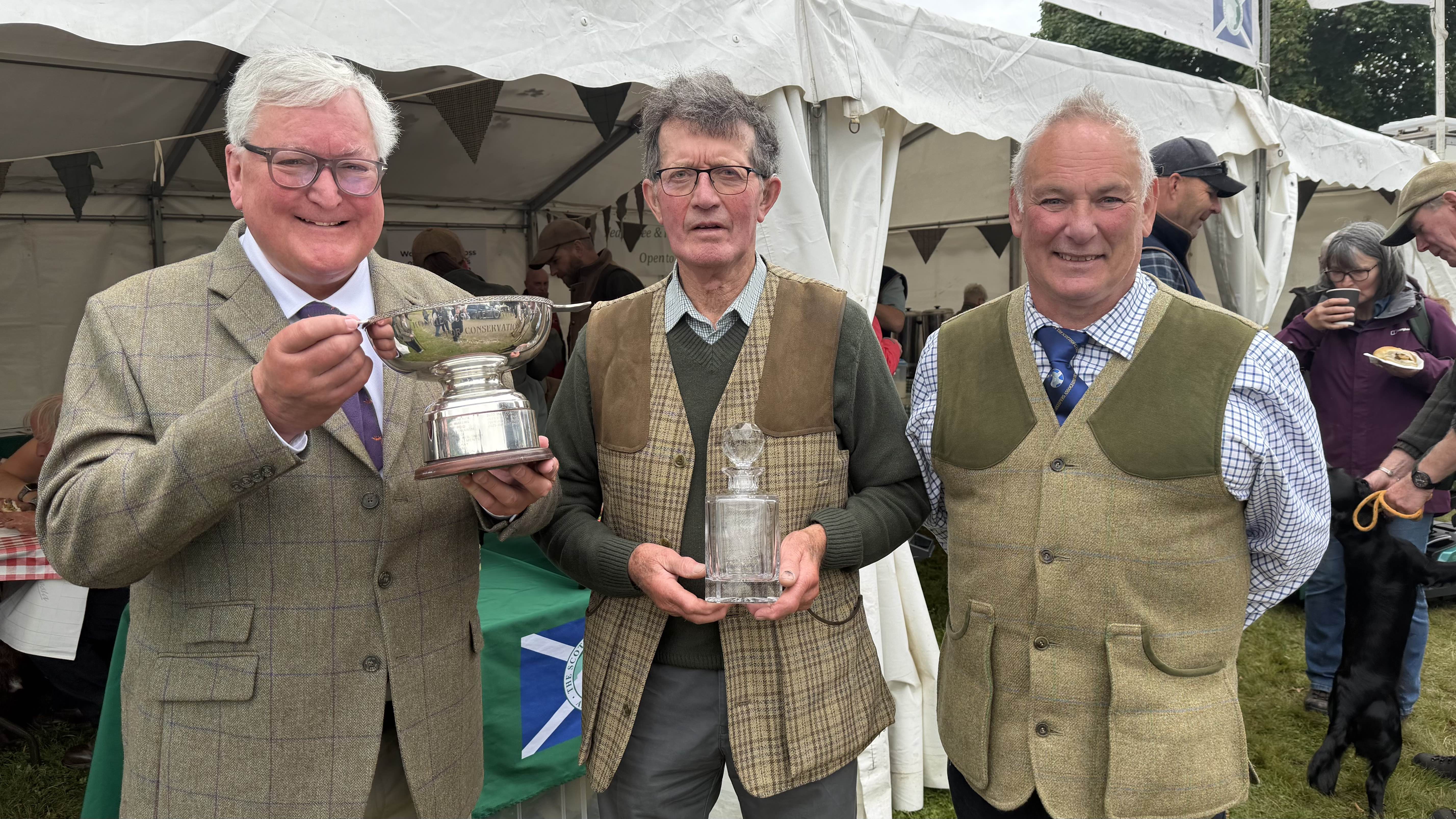 Fergus Ewing received the Ronnie Rose Award from the SGA and warned Scottish Government to scrap muirburn licensing